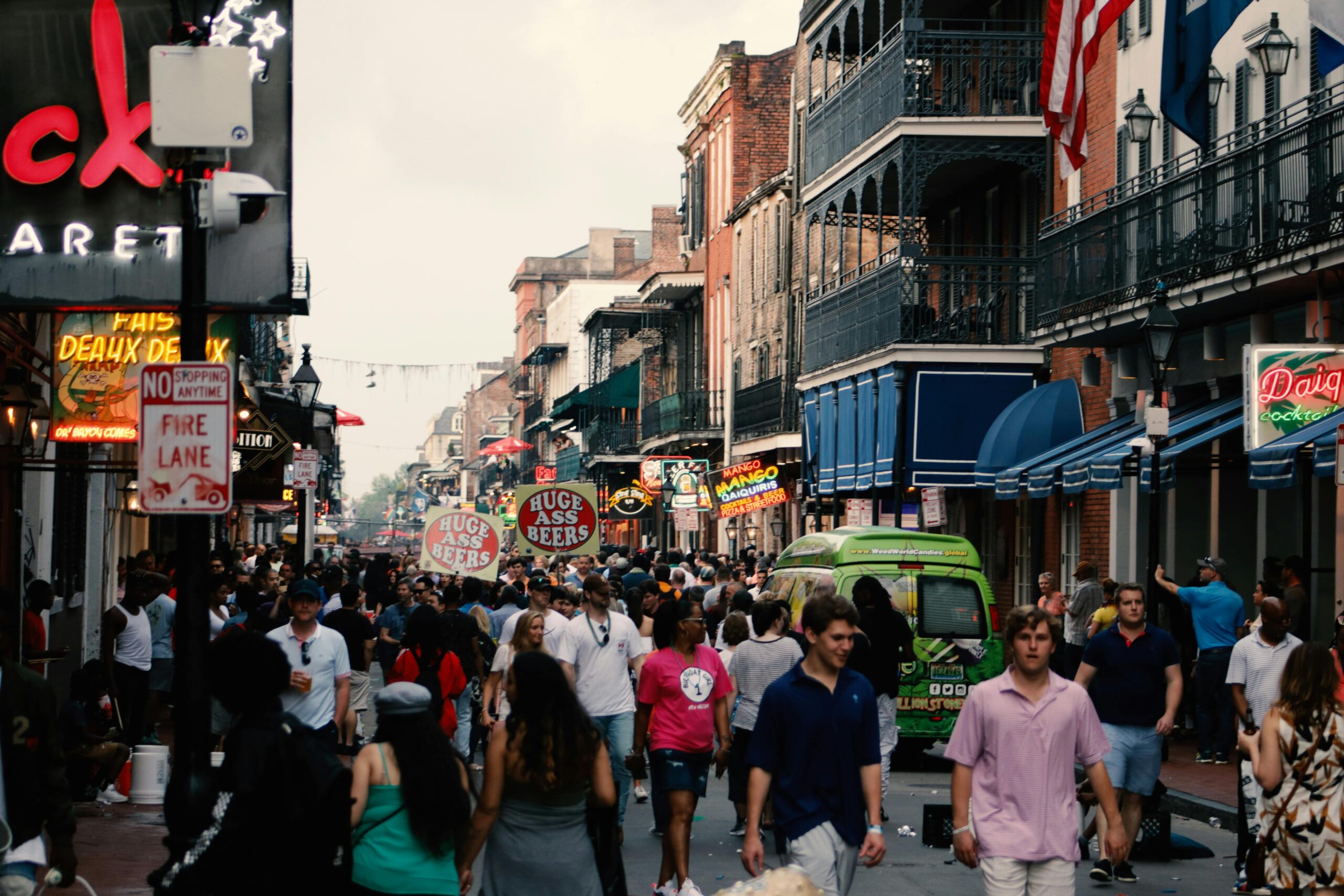 New Orleans' French Quarter with people walking on the streets